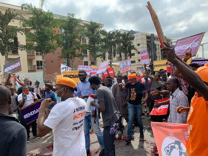 end sars protest in lagos and abuja by runtown, tiwa,falz,