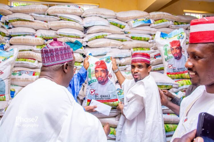 Hardship: Kano house of Rep member Gives 18,600 Bags of Grains and N20m To 1000 youths