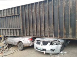 Eight School Children Escape Death As Truck Falls On 2 Cars A devastating accident occurred in Lokoja on Thursday when a 40-feet articulated container fell on two vehicles, trapping eight school children inside one of the cars. However, in a miraculous turn of events, all eight children were rescued unhurt.