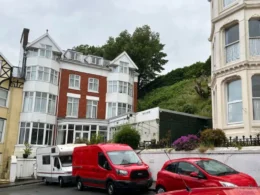 Seaside Hotel and Former Bank Offices Used in $5M Fraud Targeting Chinese Victims
