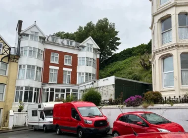 Seaside Hotel and Former Bank Offices Used in $5M Fraud Targeting Chinese Victims