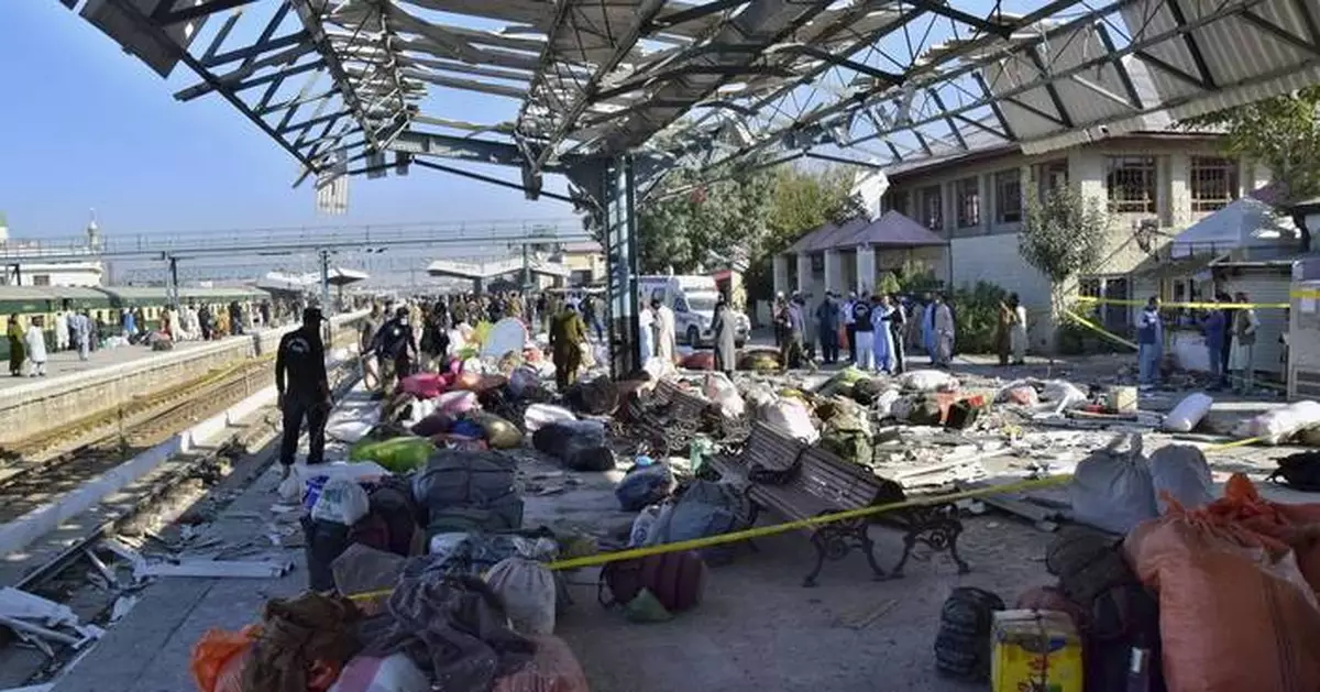 Devastating Blast at Railway Station Claims 26 Lives, Including 14 Soldiers Firefighters and rescuers work through abandoned luggage on the platform