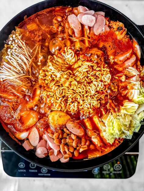 JUST IN: Kim Jong-un Bans Hot Dogs And Declares Divorce A Crime In Crackdown On Western Culture The spicy noodle dish Budae jjigae