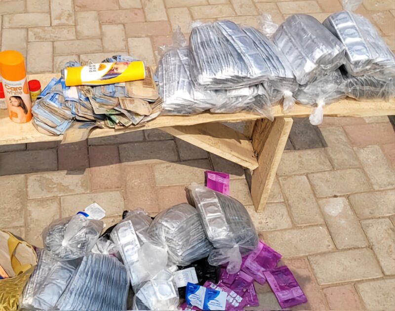 Items recovered from the scene included lubricants, drugs, cash, and charms.